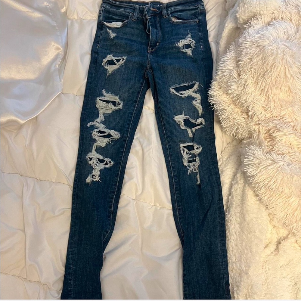 Dark wash distressed skinny jeans. American Eagle; size 6.